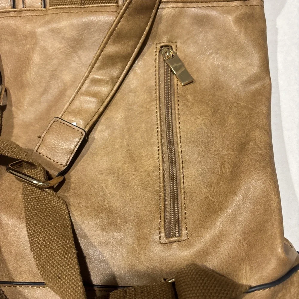 Parker Laser Cut Buckle‎ Fold Over Backpack Vegan Leather in Tan